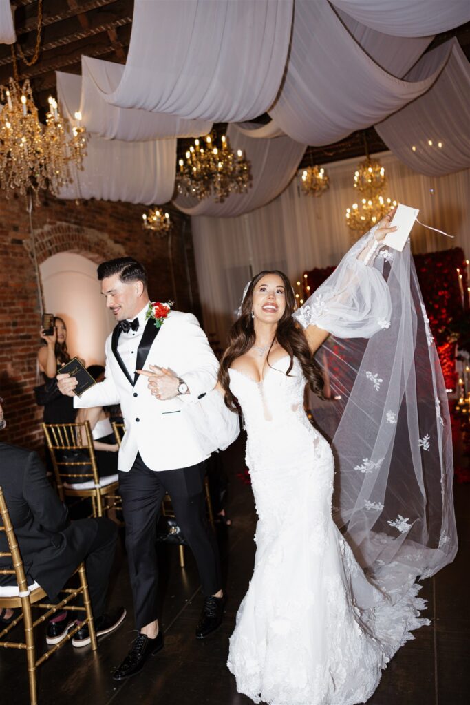 newlyweds heading to their wedding reception