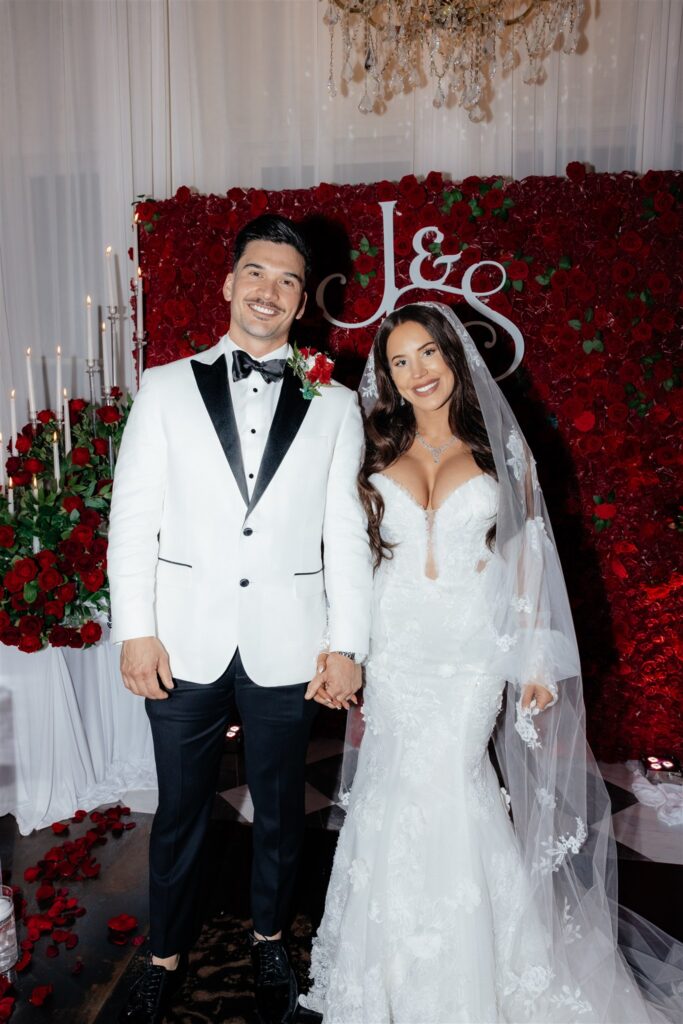 cute picture of the bride and groom holding hands