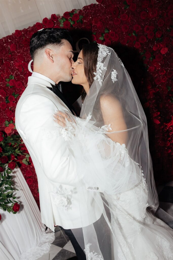 cute picture of the bride and groom kissing