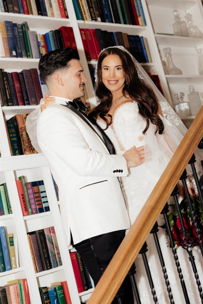 bride and groom smiling at each other