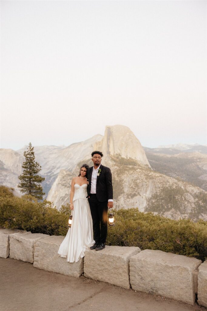 couple smiling at the camera during their photoshoot