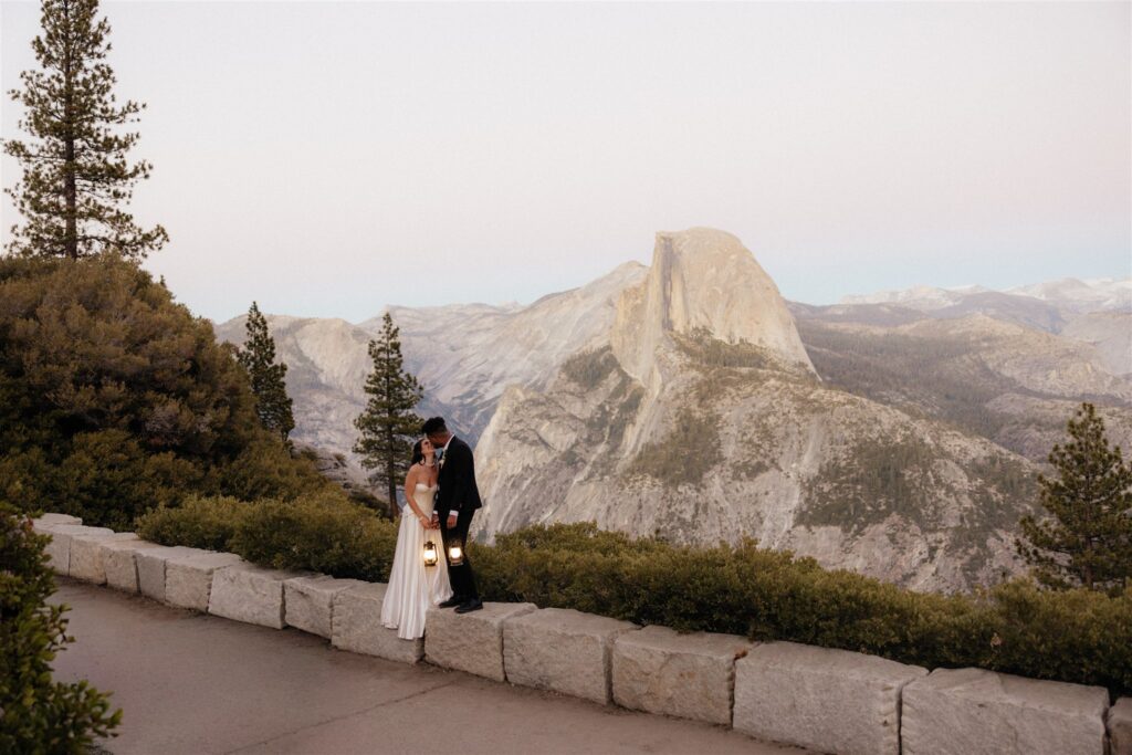 groom kissing the bride on the forehead