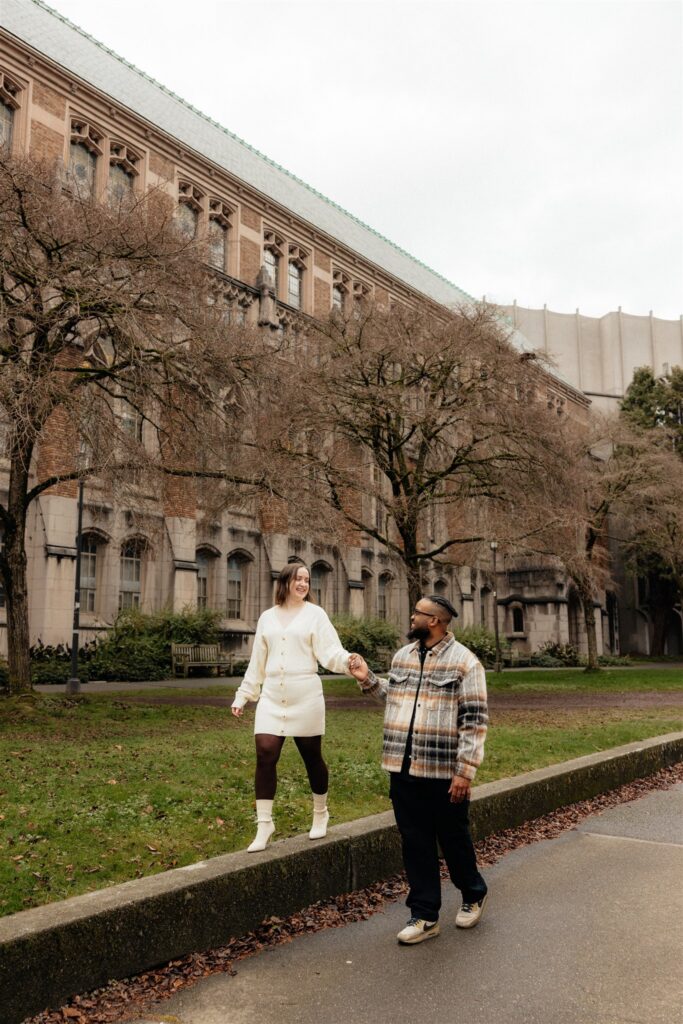 couple holding hands during their fall photoshoot
