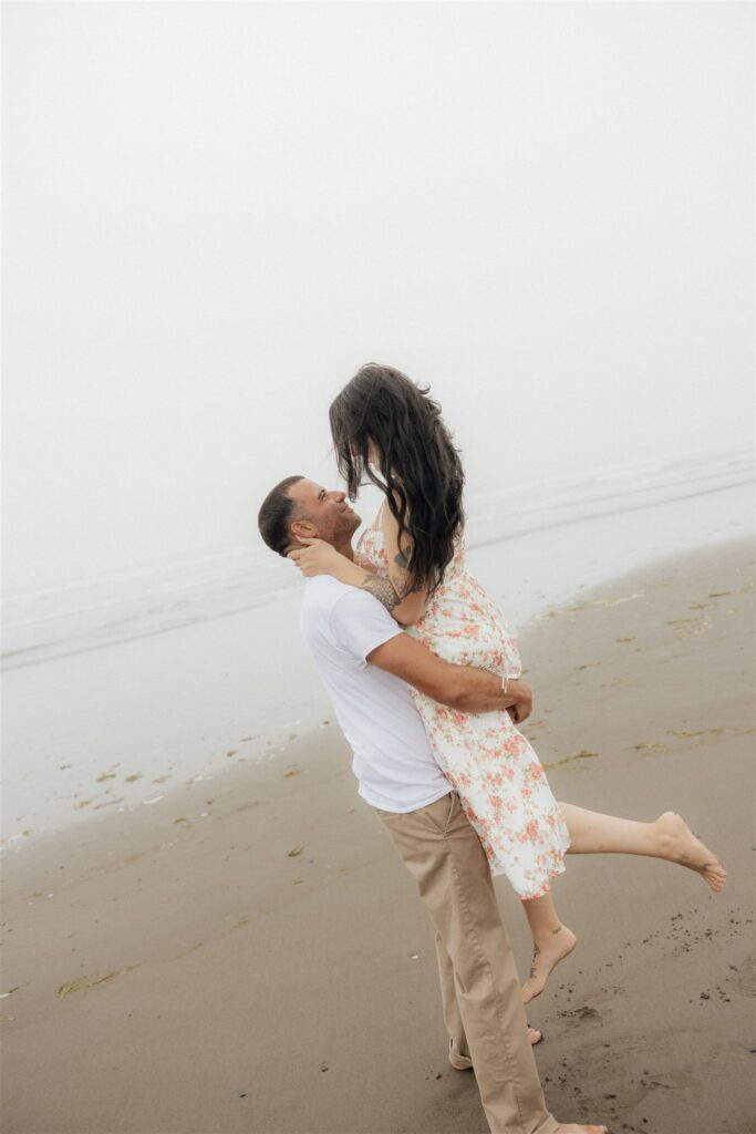 couple walking around the beach during their photoshoot