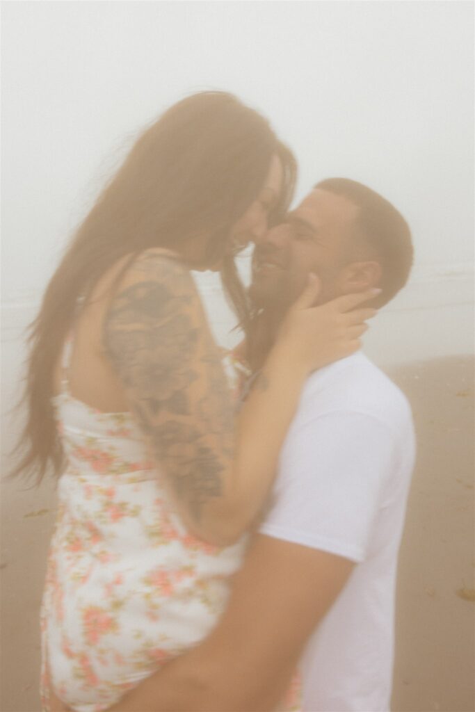 Moody Washington Coast Couple Photos at Cohassett Beach | Madison & Anthony