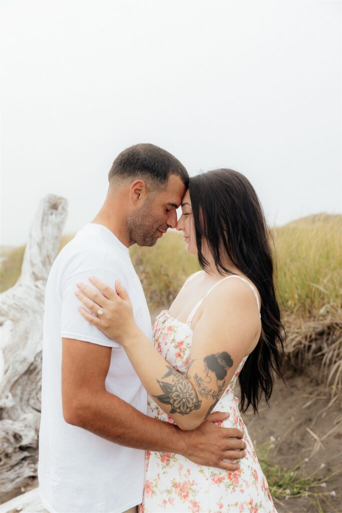 couple kissing during their playful portraits
