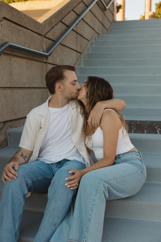 newly engaged couple kissing during their photoshoot