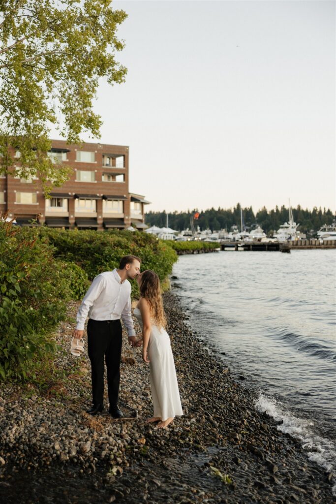 cute picture of the couple kissing during their golden hour photoshoot