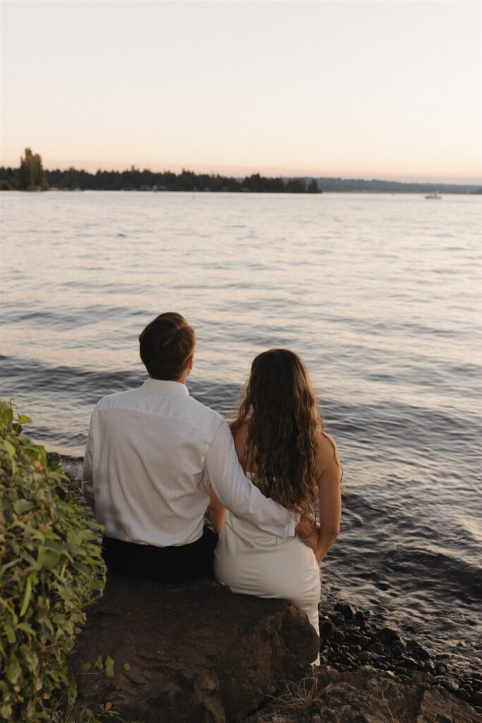 cute picture of the couple hugging during their beach photoshoot