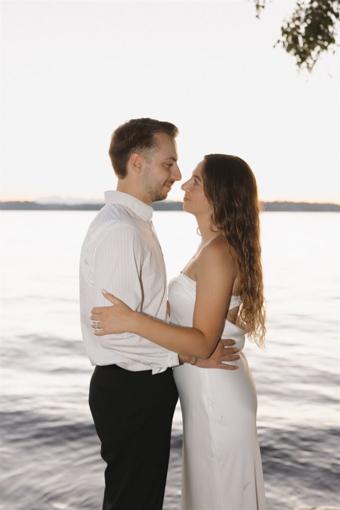 fiance kissing his fiance on the forehead