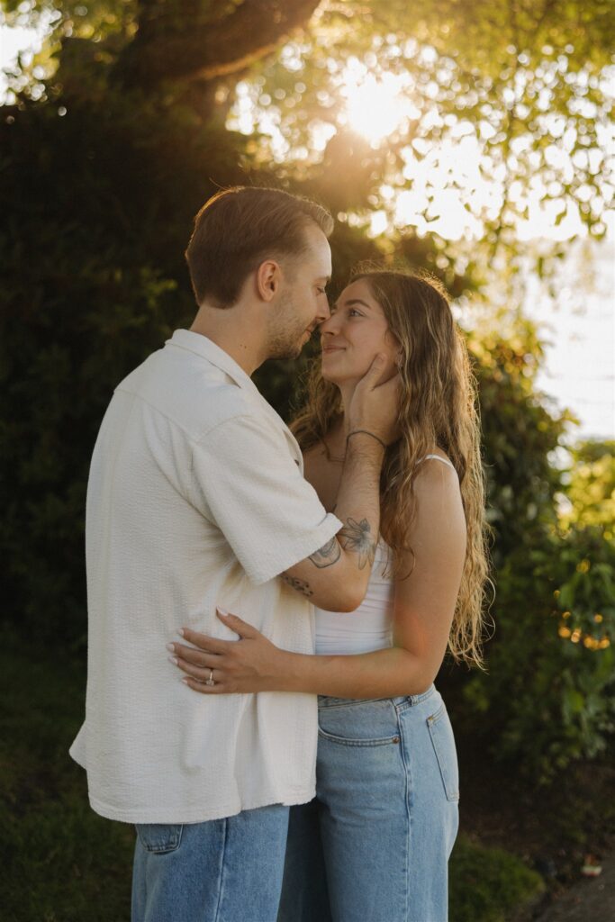 newly engaged couple kissing during their engagement session
