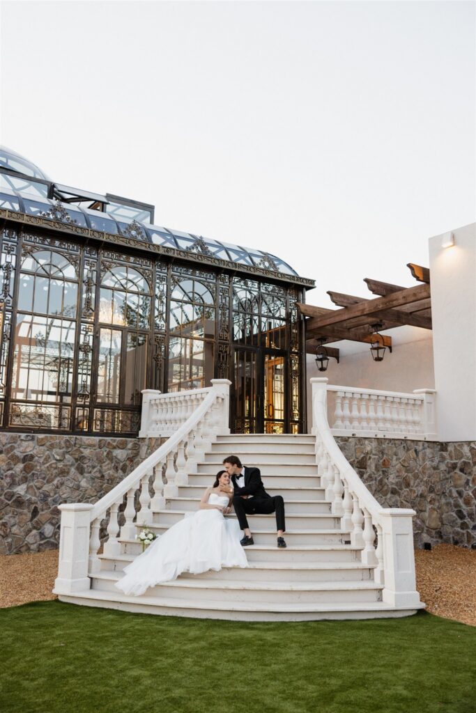 groom kissing the bride on the cheek