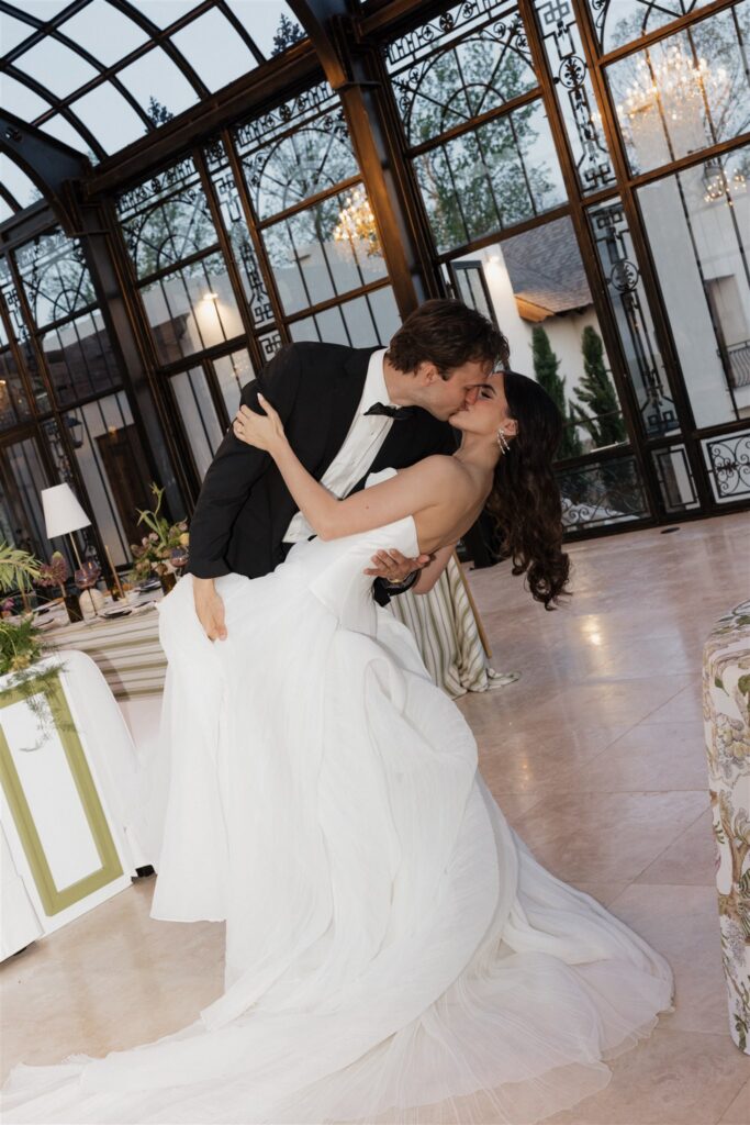 cute picture of the newlyweds kissing