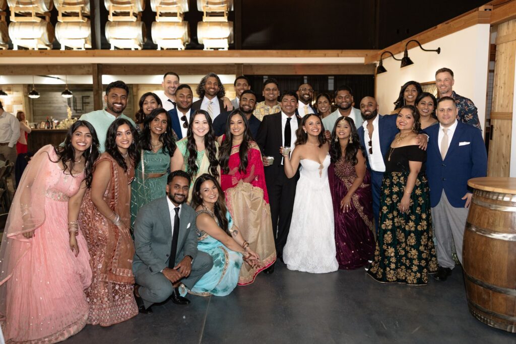 cute picture of the bride and groom with their guests