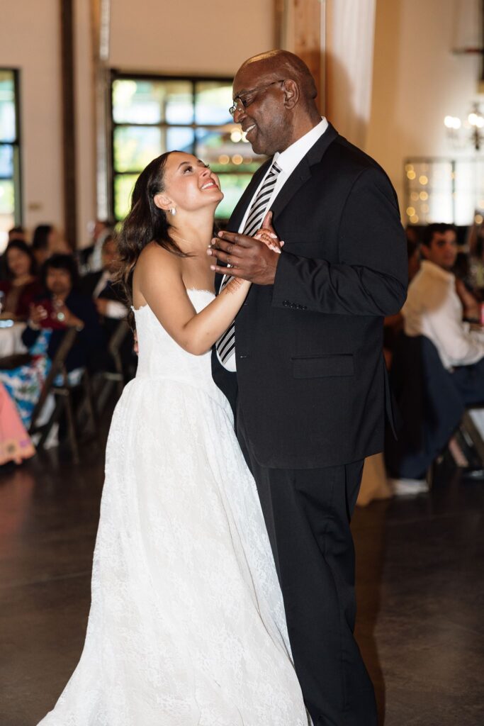 bride and her dad dancing at the wedding reception party