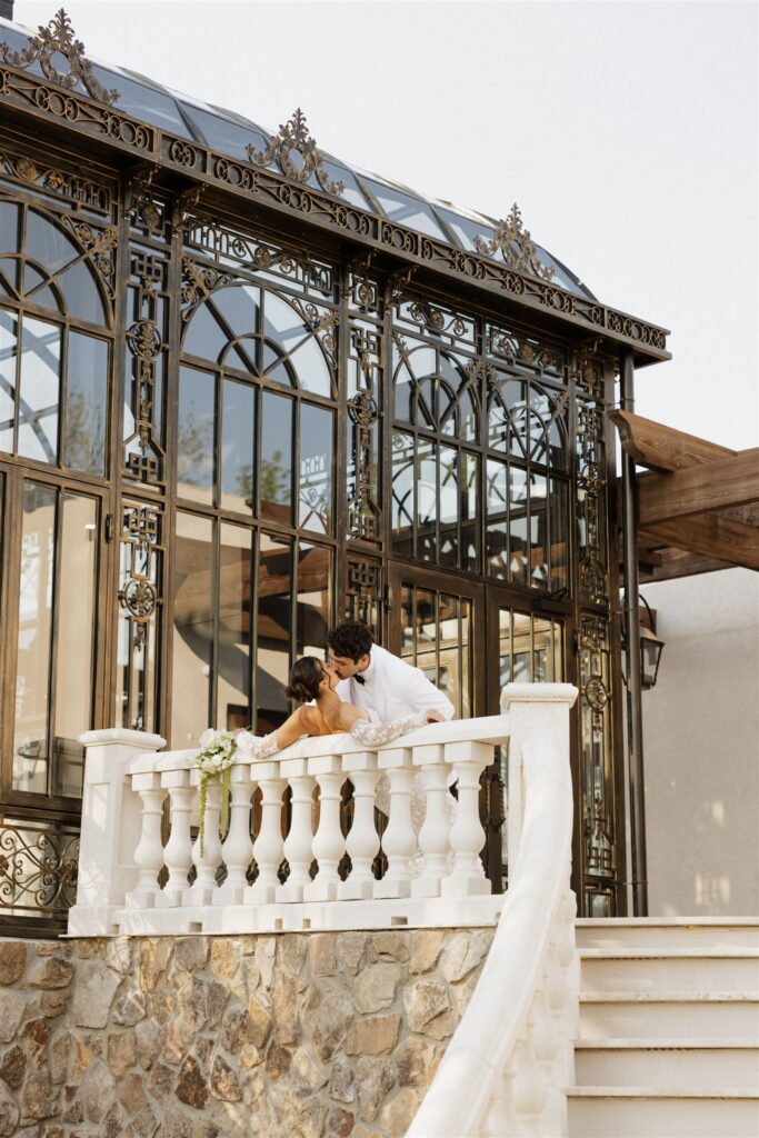 cute picture of the newlyweds kissing