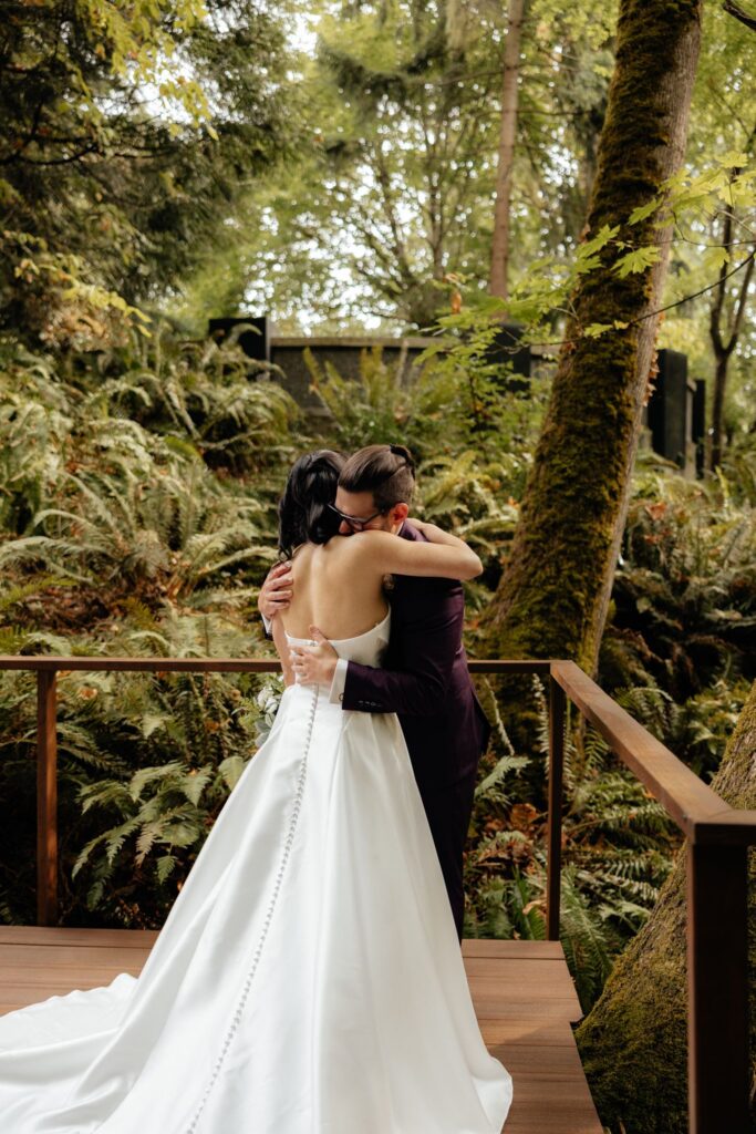 cute picture of the bride and groom hugging