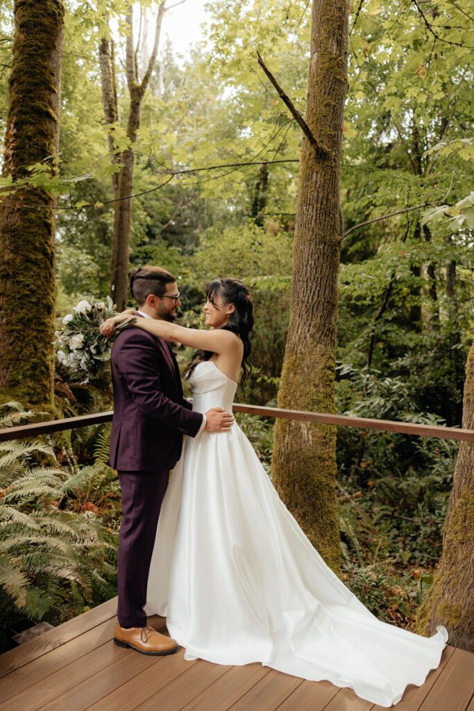cute picture of the bride and groom hugging
