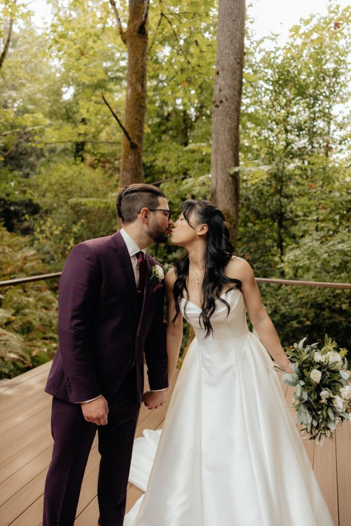cute picture of the newlyweds kissing