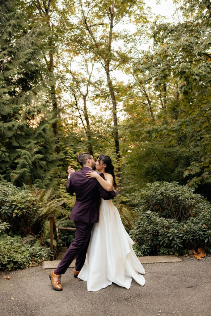 cute picture of the bride and groom kissing