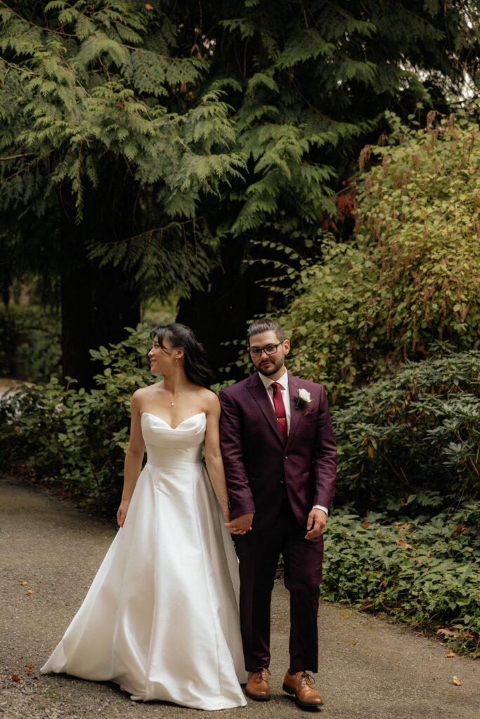 Picture of the bride and groom holding hands