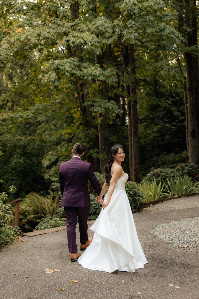 cute portrait of the newly married couple holding hands