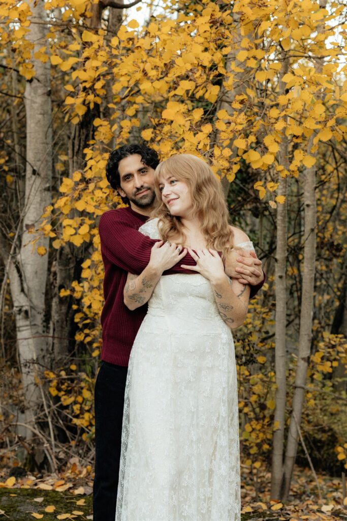 cute picture of the newly engaged couple smiling at each other