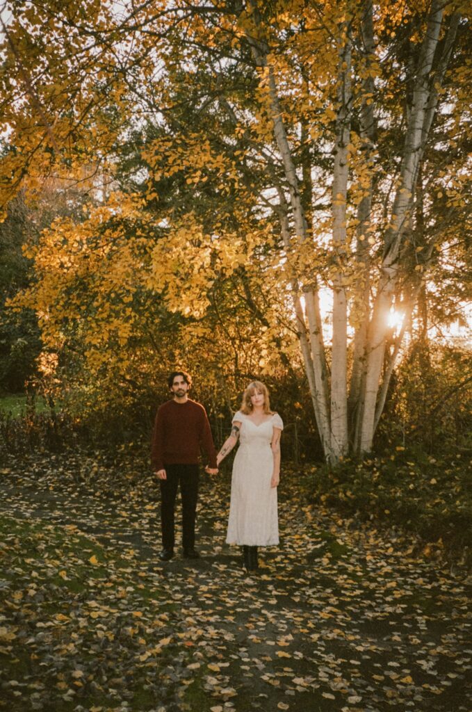 cute picture of the newly engaged couple holding hands