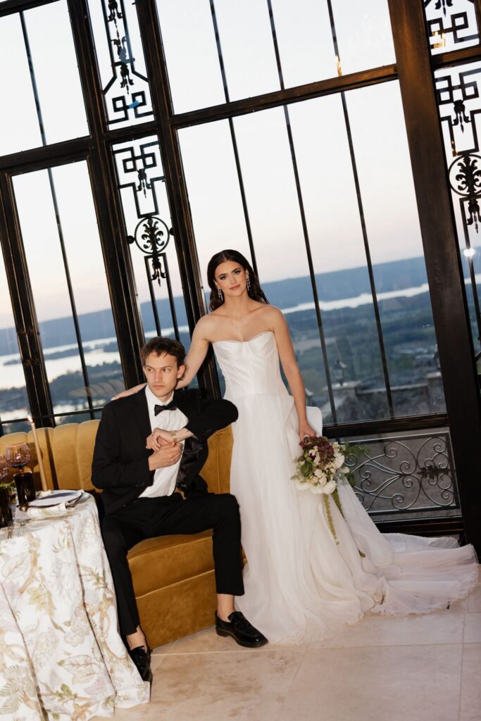 couple smiling at the camera during their photoshoot