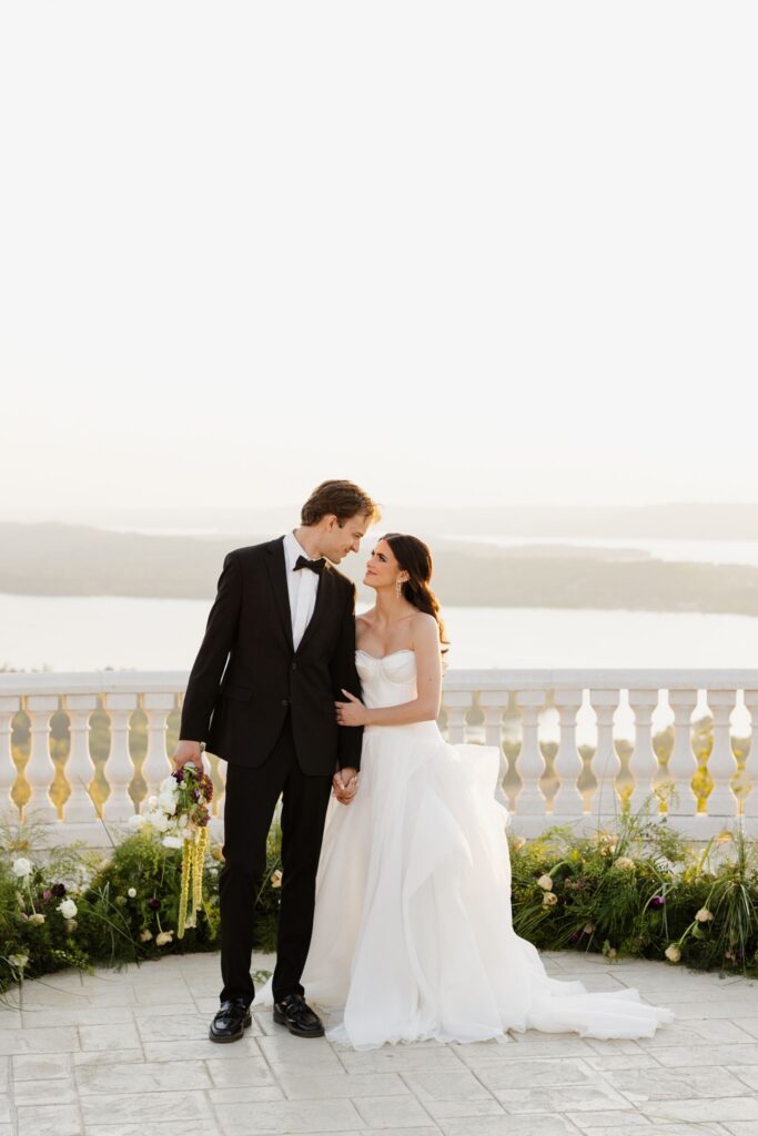 cute picture of the bride and grooms smiling at each other