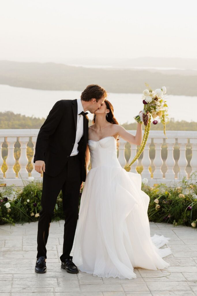 cute picture of the newlyweds kissing