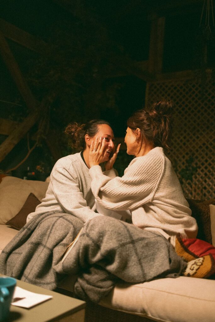 cute picture of the couple smiling at each other during their photoshoot