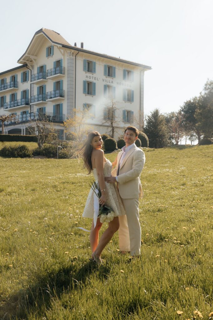 couple smiling at the camera during their photoshoot