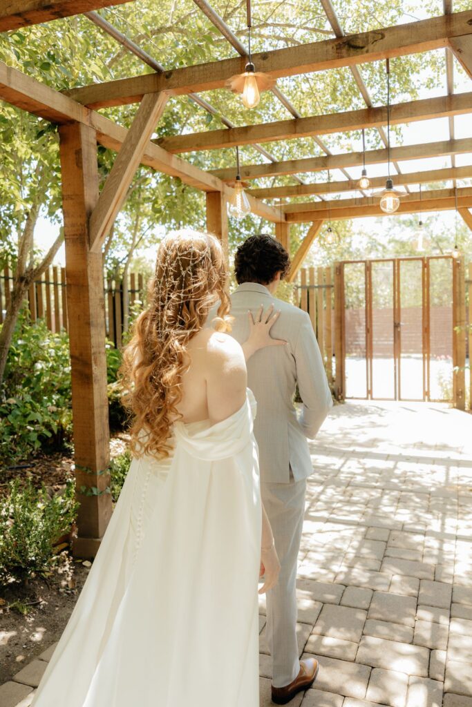 bride and groom at their first look