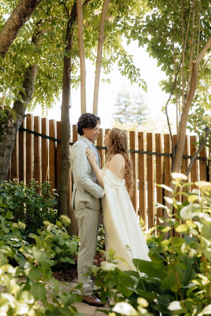 cute picture of the newlyweds smiling at each other