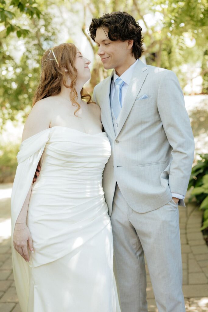 cute picture of the newlyweds laughing with each other