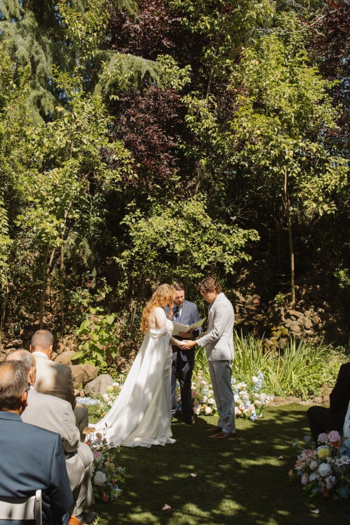 bride and groom emotional during their wedding ceremony
