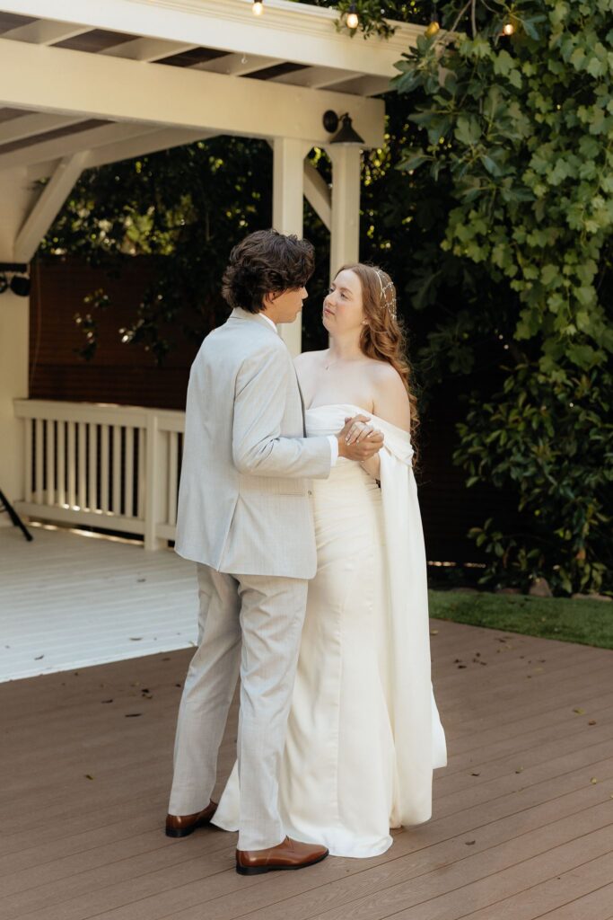 cute picture of the newly married couple damcing