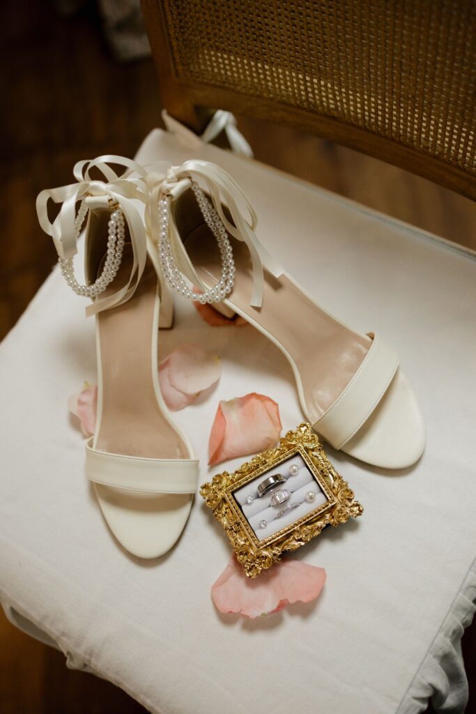 beautiful picture of the wedding shoes and the wedding rings