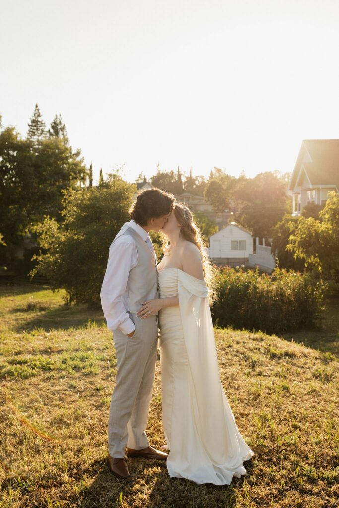 cute picture of the newlyweds kissing