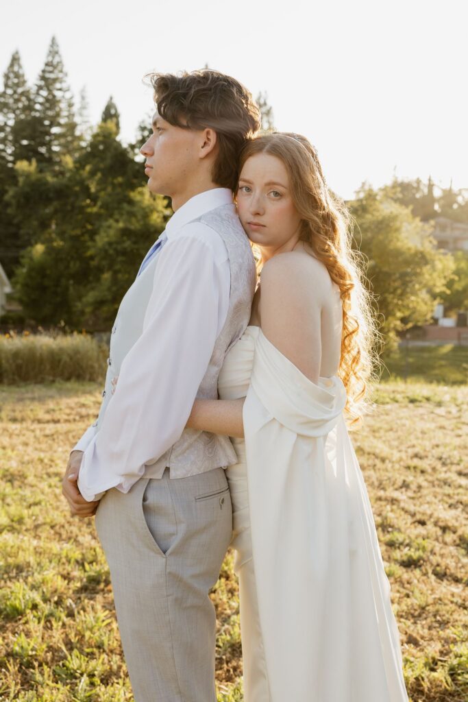 newlyweds kissing during their photoshoot