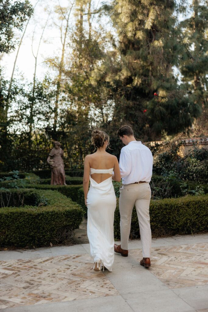cute picture of the newly engaged couple holding hands