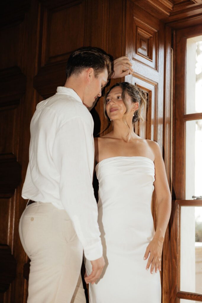 cute picture of the newly engaged couple smiling at each other