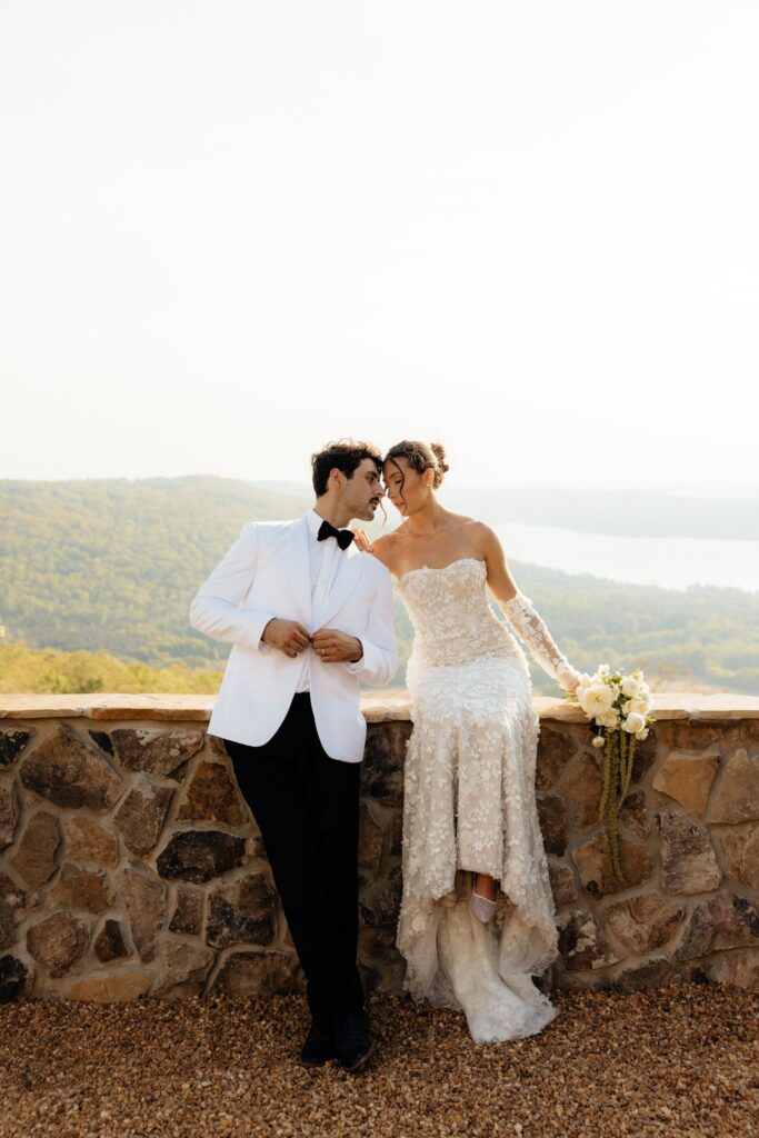 bride kissing the groom on the cheek