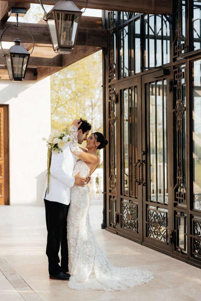cute picture of the bride and groom hugging