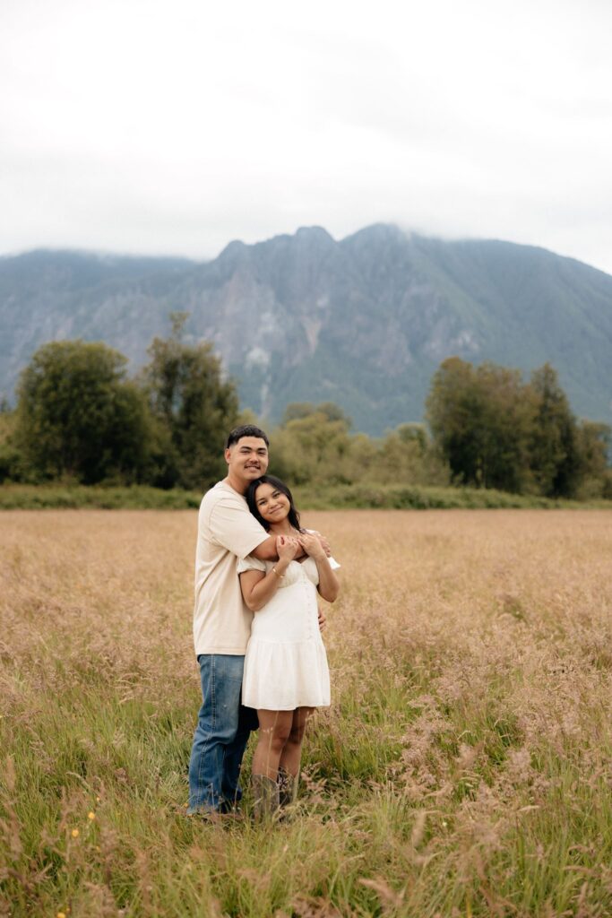couple posing for the camera during their photoshoot