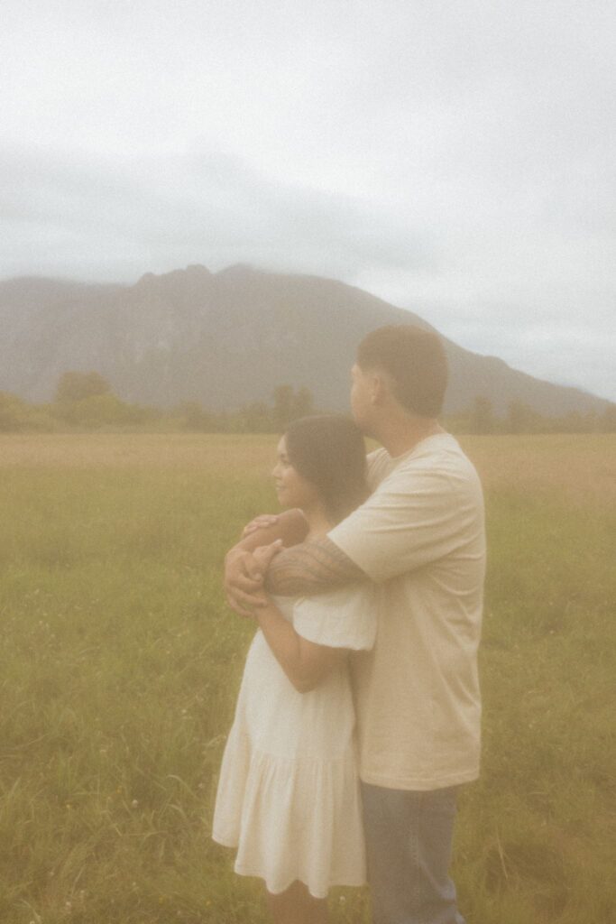 cute picture of the newly engaged couple hugging