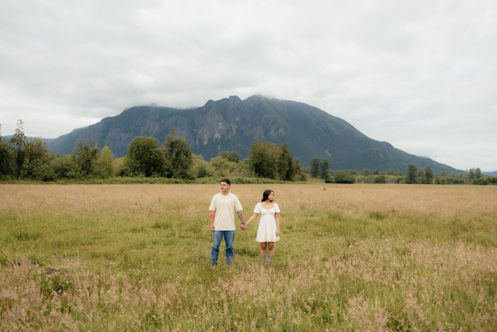 couple holding hands during their photoshoot