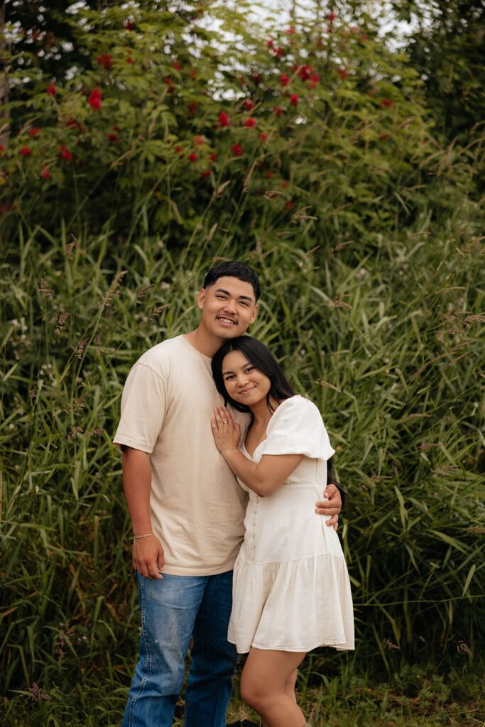 cute picture of the newly engaged couple hugging