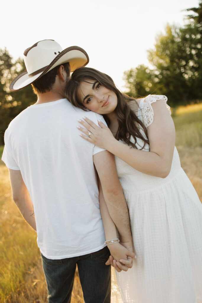 couple smiling at the camera during their session